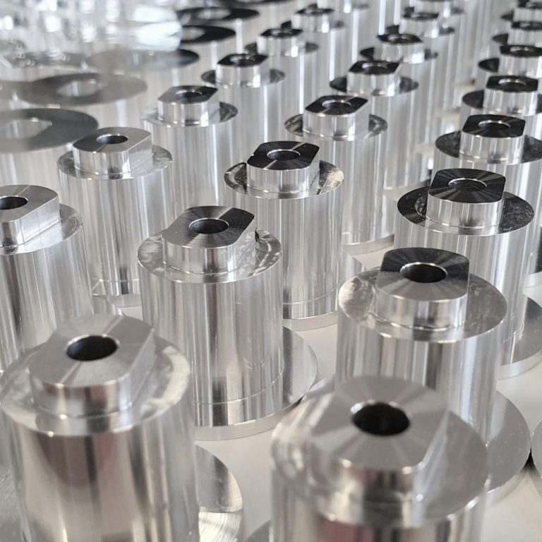 Array of machined components, high tolerance surface finishely 